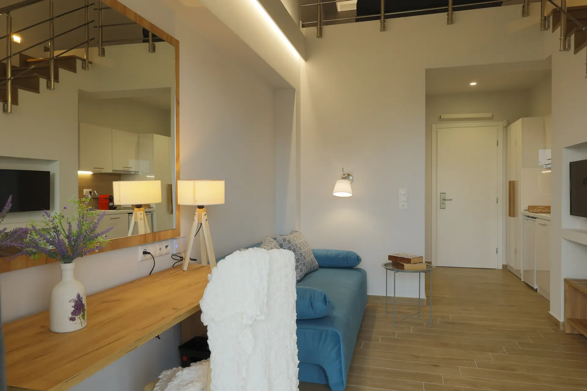 Suite with desk, mirror and blue sofa