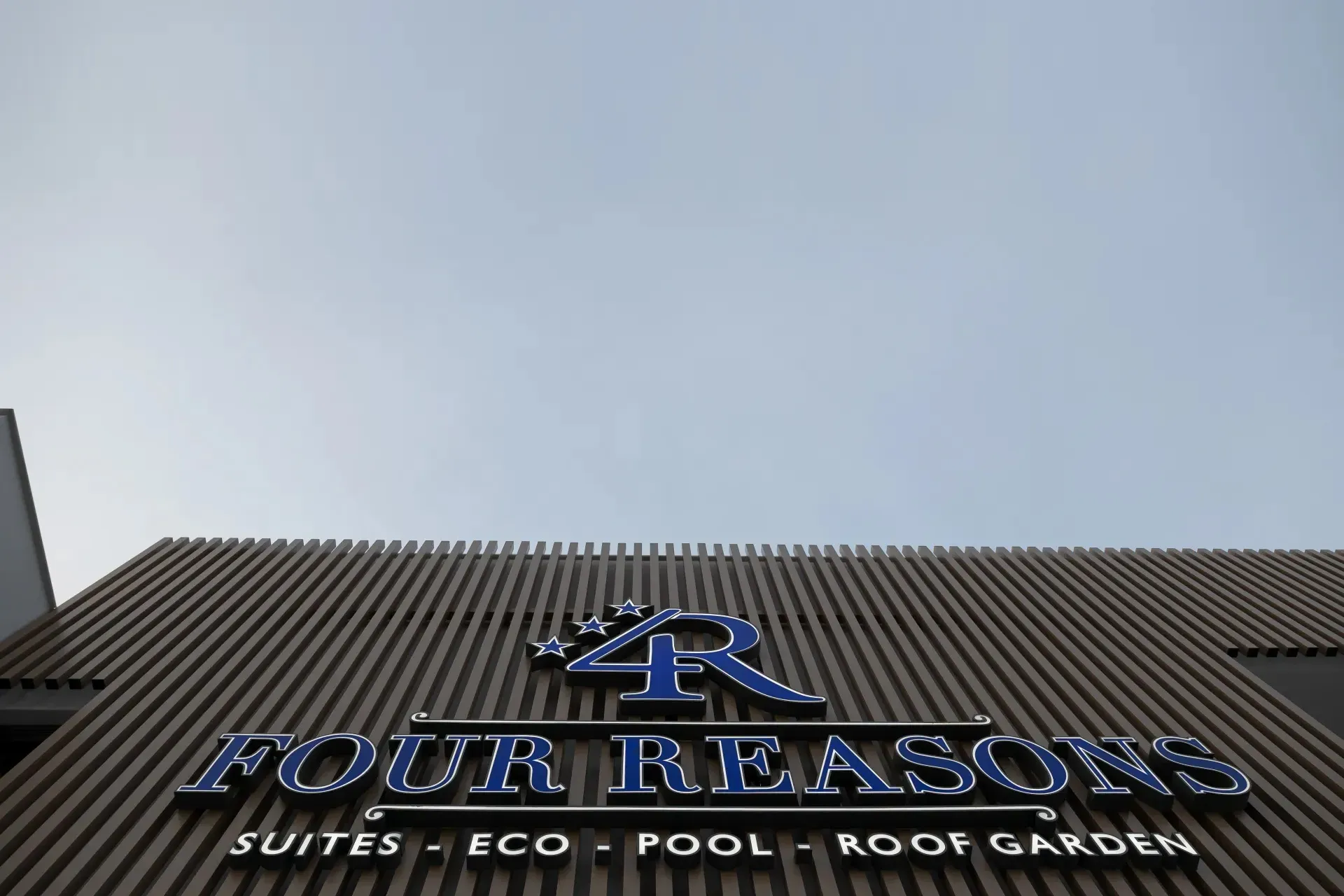 The Four Reasons sign - Suites, Eco, Pool, Roof Garden